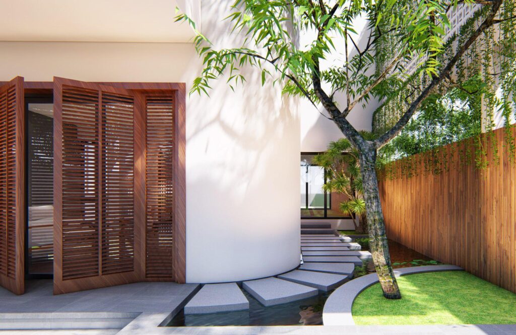 Sân rộng có khu vực tiểu cảnh bên cạnh nhà